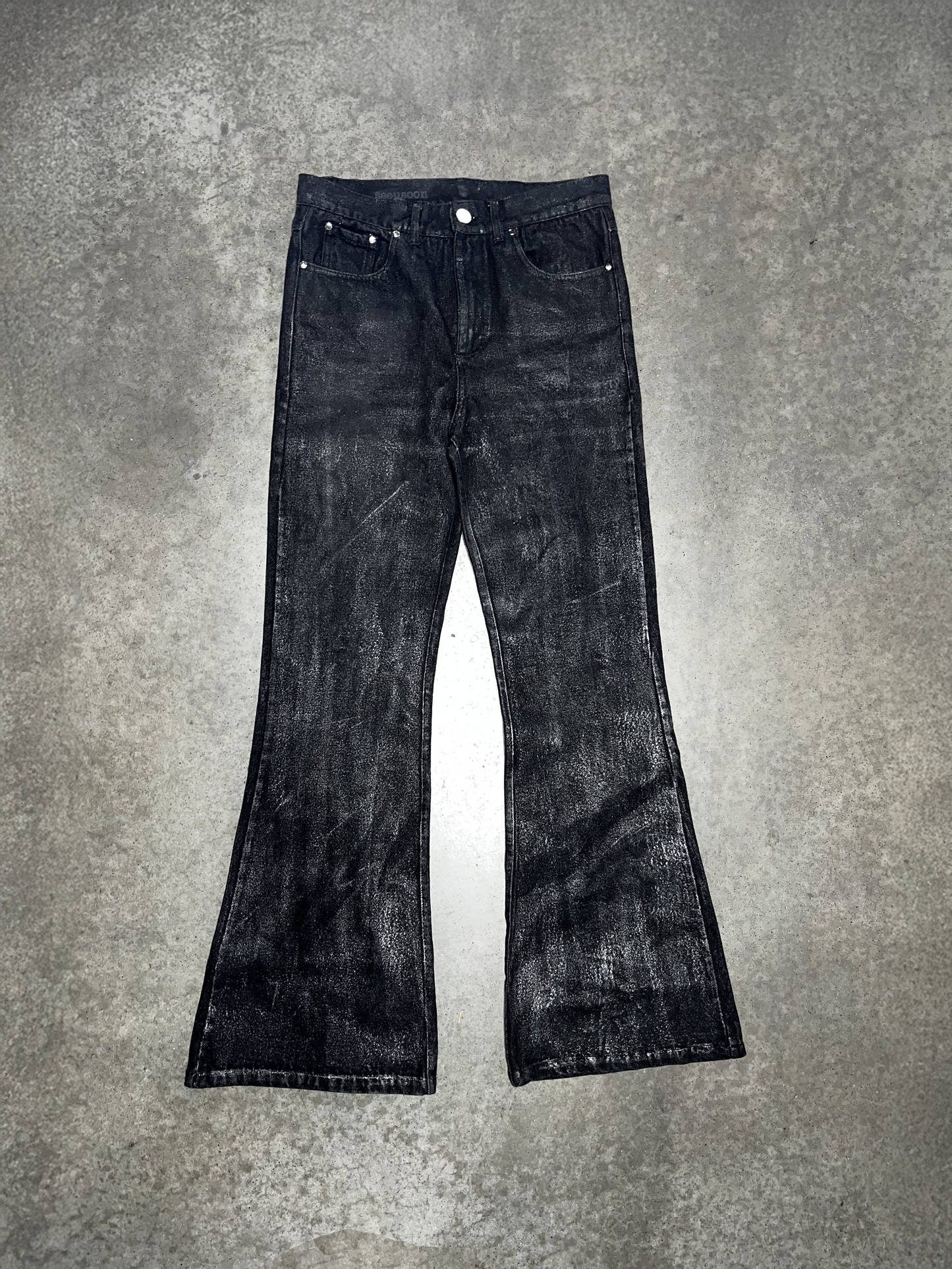 WAXED FLARED JEANS